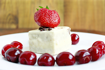 Image showing ripe red berries of strawberry cherry and cake on the plate