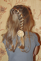 Image showing head of young girl with nice braids