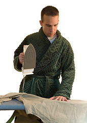 Image showing Man Ironing