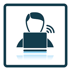 Image showing Businessman sitting behind a laptop icon