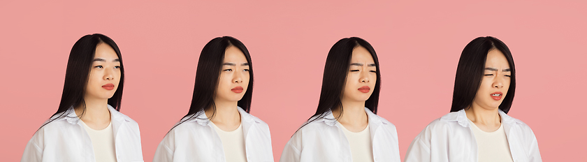 Image showing Evolution of emotions. Asian young woman\'s portrait on pink studio background. Concept of human emotions, facial expression, youth, sales, ad.