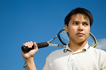 Image showing Asian male playing tennis