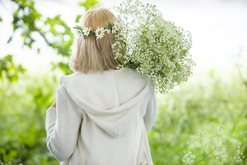 Image showing Girl Wearing a Flower Wreath