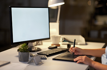 Image showing designer with computer and pen tablet at office