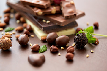 Image showing close up of different chocolates, candies and nuts