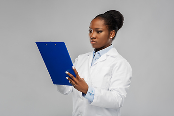 Image showing african american female doctor with clipboard