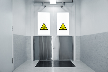 Image showing hospital doors with quarantine sign