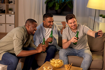 Image showing male friends with smartphone taking selfie at home