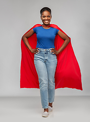 Image showing happy african american woman in red superhero cape