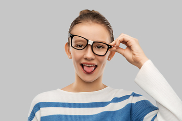 Image showing funny teenage student girl in glasses
