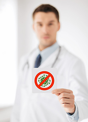 Image showing male doctor holding coronavirus sign