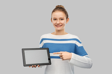 Image showing happy smiling teenage girl with tablet computer