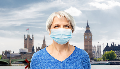 Image showing senior woman in protective medical mask in england