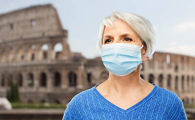 Image showing senior woman in protective medical mask in italy