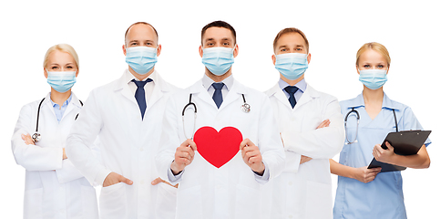 Image showing doctors in protective medical masks with red heart