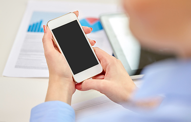 Image showing close up of woman with smartphone at office