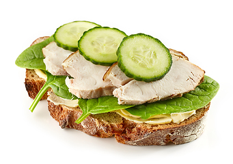 Image showing slice of bread with chicken meat and cucumbers