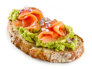 Image showing slice of bread with avocado and salmon