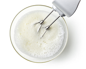 Image showing beating egg whites cream with mixer in the bowl