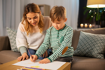 Image showing mother and son with pencils drawing at home