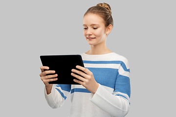 Image showing happy smiling teenage girl using tablet computer