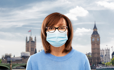 Image showing senior woman in protective medical mask in england