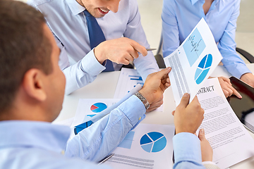 Image showing close up of business team with charts at office