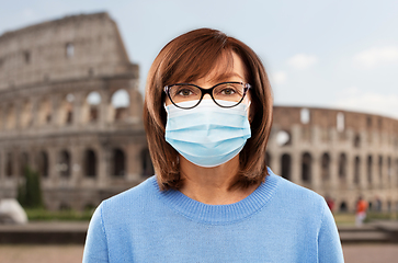 Image showing senior woman in protective medical mask in italy