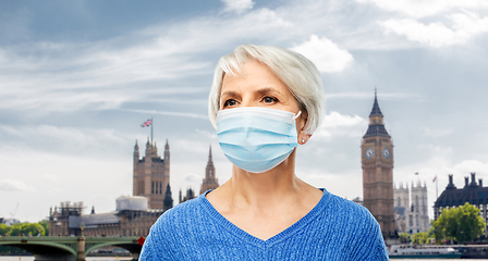 Image showing senior woman in protective medical mask in england