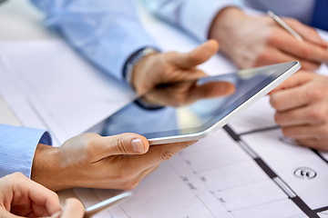 Image showing architects with tablet pc and blueprint at office