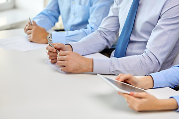 Image showing hands of business people at conference at office