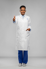 Image showing african american female doctor showing thumbs up