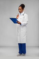 Image showing african american female doctor with clipboard