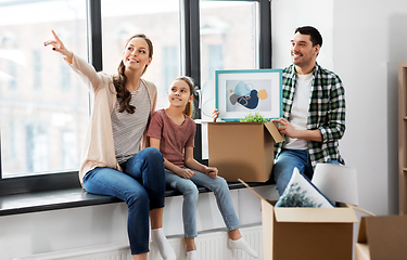 Image showing happy family with child moving to new home