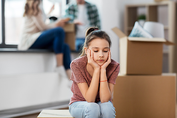 Image showing sad girl moving to new home with her family