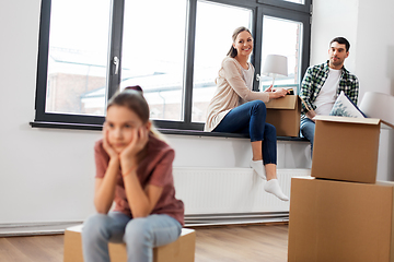 Image showing sad girl moving to new home with her family