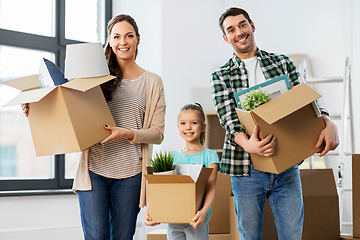 Image showing happy family with child moving to new home