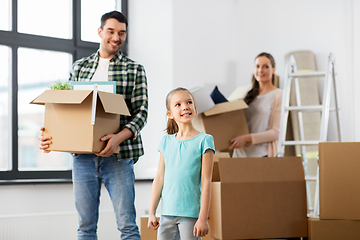 Image showing happy family with child moving to new home