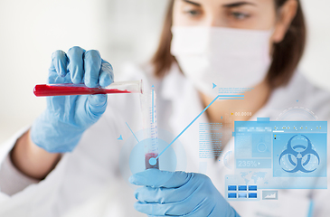 Image showing close up of scientist making blood test in lab