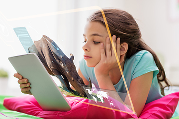 Image showing girl with tablet pc learning nature online at home