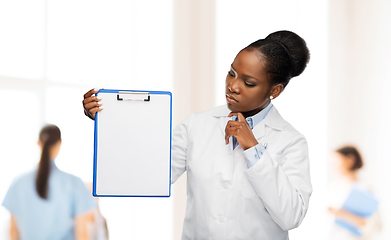 Image showing african american female doctor with clipboard