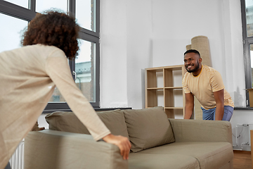 Image showing happy couple moving to new home