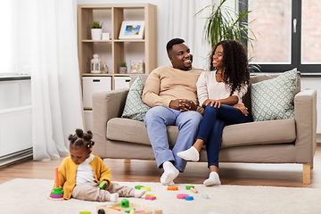 Image showing african family with baby daughter playing at home