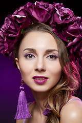 Image showing beautiful girl with purple makeup and flowers