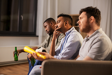 Image showing sad friends with ball and vuvuzela watching soccer