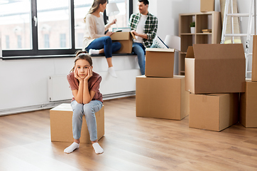 Image showing sad girl moving to new home with her family