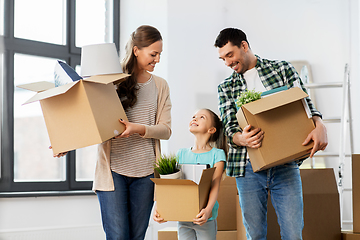 Image showing happy family with child moving to new home