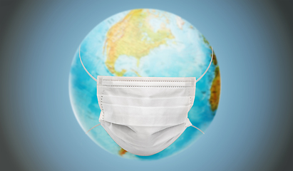 Image showing earth planet globe in protective medical mask