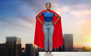 Image showing happy african american woman in red superhero cape