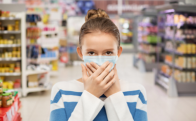 Image showing teenage girl in medical mask at supermarket